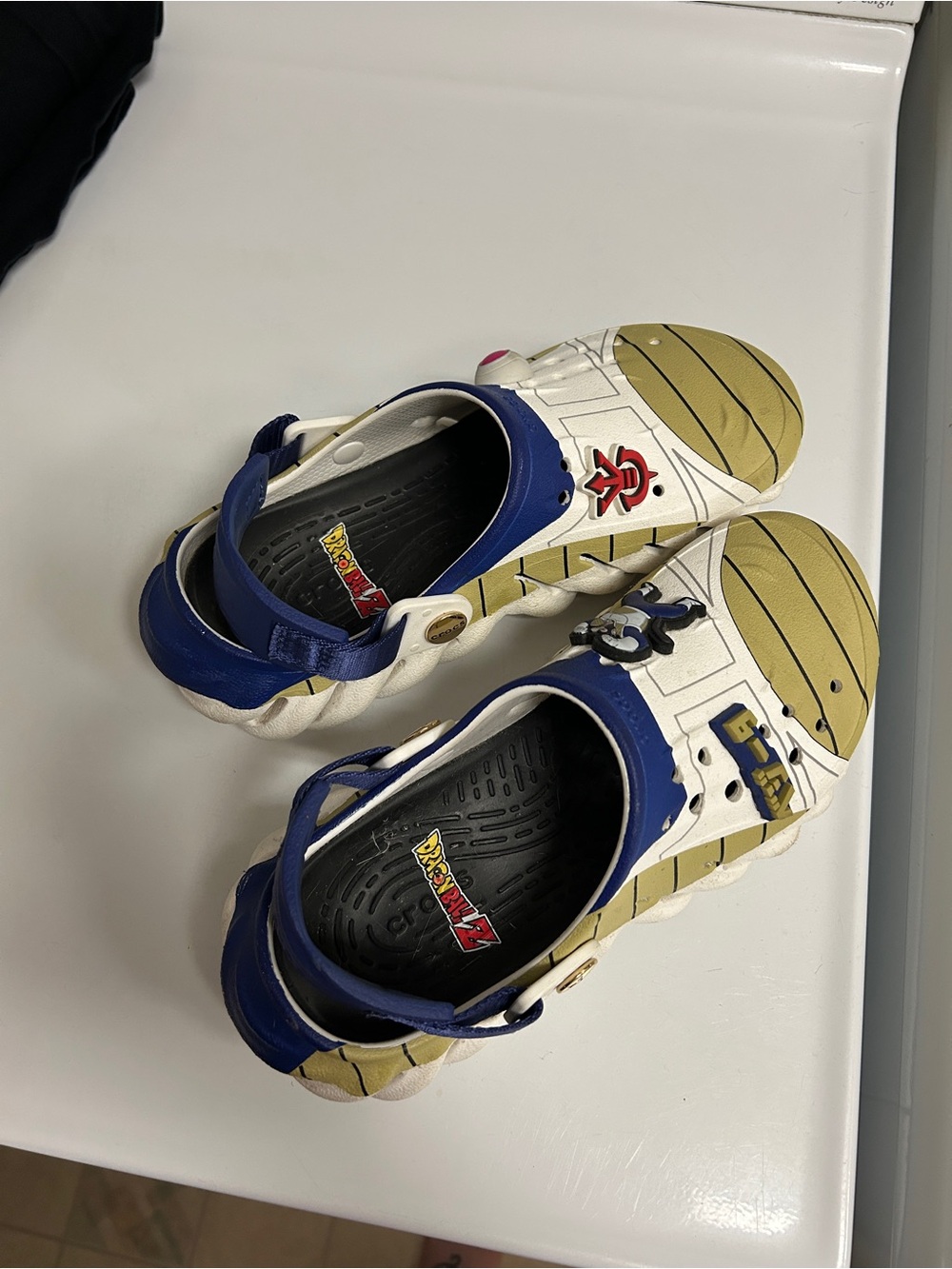 CROCS Dragon Ball Z Kids Slip-On Clogs in White, Blue & Gold